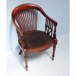 An early 20th century mahogany stick-back tub office armchair, with interesting inverted