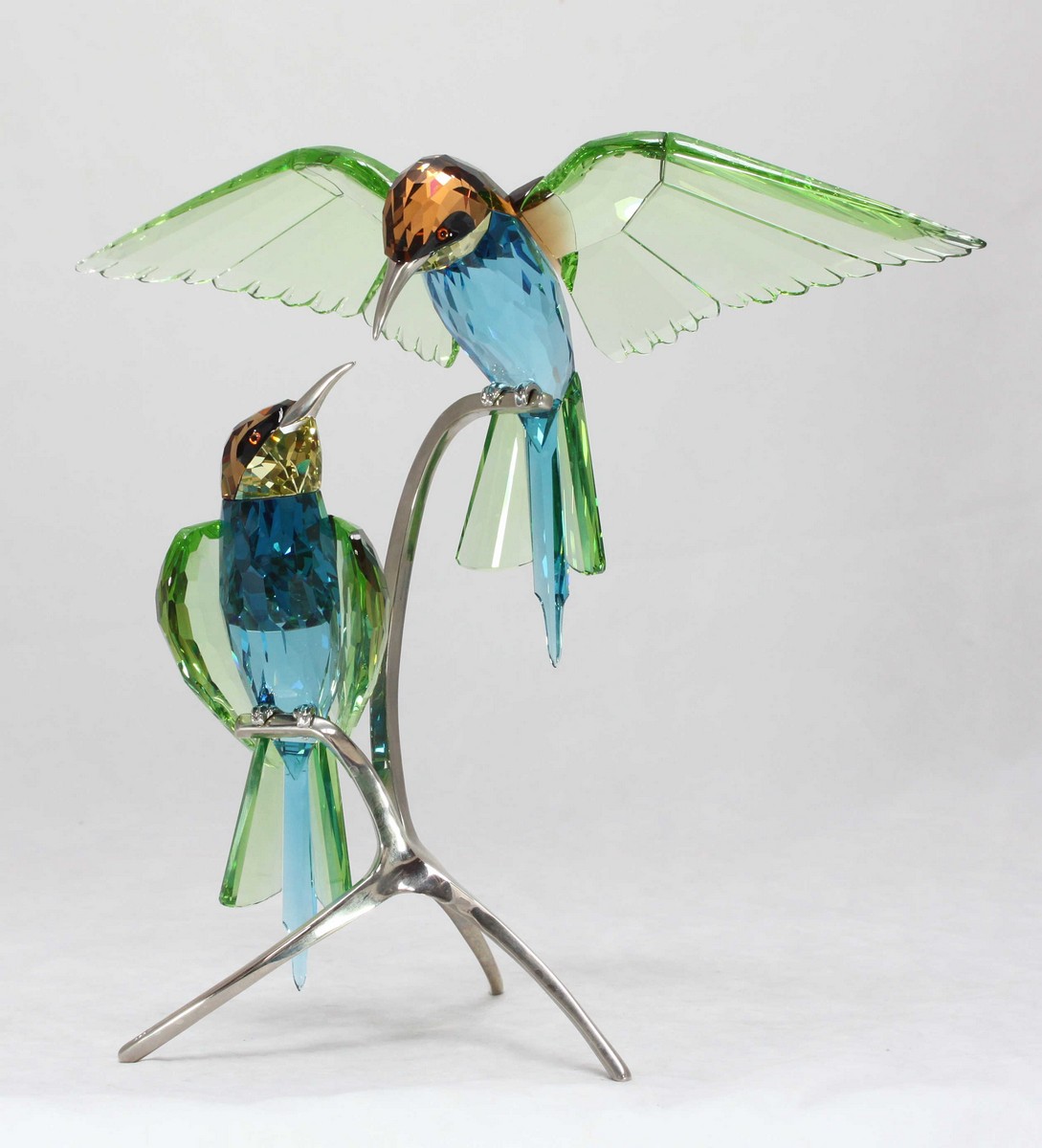 A Swarovski crystal 'Bee Eaters peridot' figurine, depicting two birds sitting upon chrome metal - Image 2 of 3