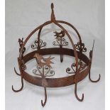 A French, wrought iron game hanger, of domed form and decorated with birds. 34cm high.