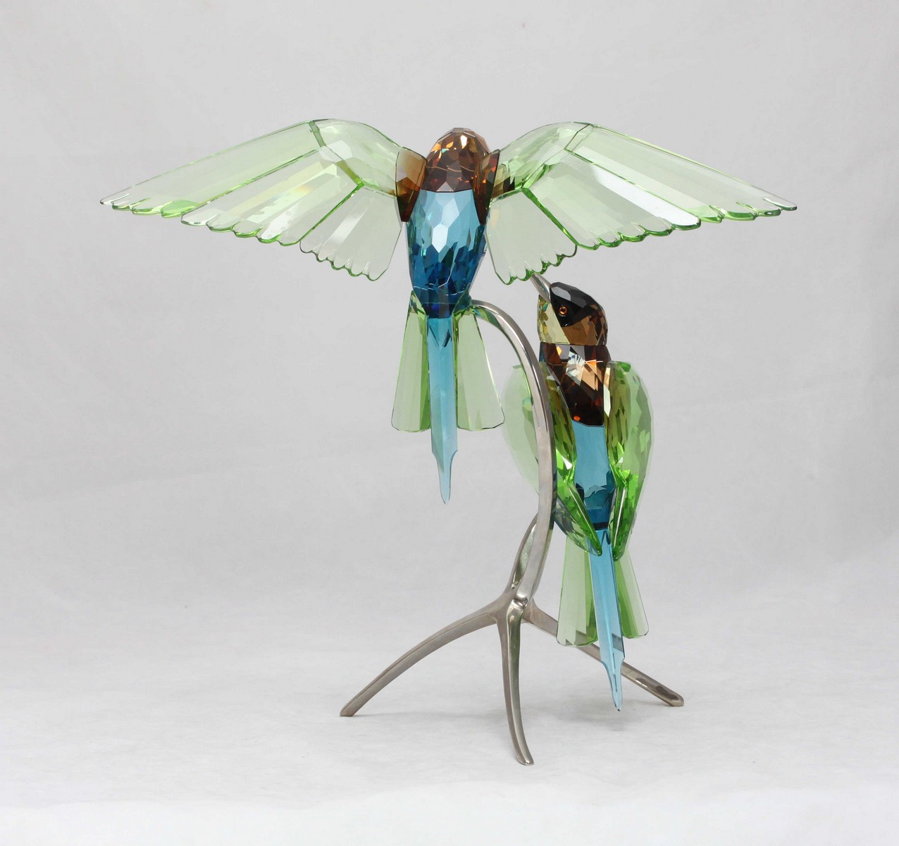 A Swarovski crystal 'Bee Eaters peridot' figurine, depicting two birds sitting upon chrome metal - Image 3 of 3