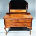 An Edwardian mahogany dressing table, the central mirror above two short, over one long drawers