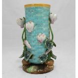 A George Jones Majolica rush-weave vase of cylindrical form modelled with climbing ivy flowers,