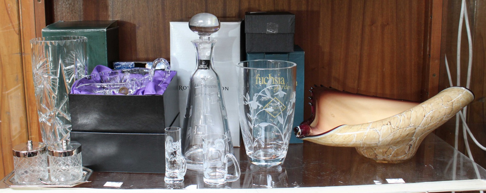 A large Cello 'free form' coloured glass bowl, a Royal Doulton 'Metro' pattern decanter and stopper,