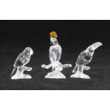 Three Swarovski crystal figures of birds, comprising a Toucan, Parrot and a Cockatoo, ref no's. 7621