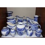 SECTION 30. A selection of Abbey blue and white ceramics, including a sauce boat mounted to a