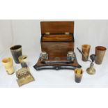 A wooden desk set with lidded letter trays and inkwells etc together with a set of six, graduated