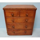 A 19th Century walnut chest of two short over three long graduated drawers with turned pulls. 93cm