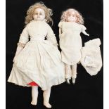 A Victorian poured-wax doll with wax limbs, (left index finger missing), 70cm long, together with