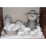 SECTION 14. A 'Winterling' porcelain dinner and coffee service comprising of thirty-six pieces and