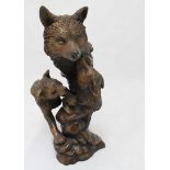 A hollow-cast patinated bronze figure group of a fox and cubs, 30cm high