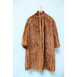 A light brown mink fur coat