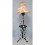 A 19th century Arts & Crafts telescoping wrought iron and copper standard oil lamp, converted to