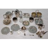 A quantity of silver-plated hollow ware, including a cruet set and jugs etc.