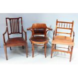 An Edwardian stained walnut armchair, together with a bentwood armchair and another armchair.