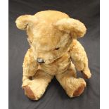 A 20th century mohair teddy bear with jointed limbs. (growler requires attention)