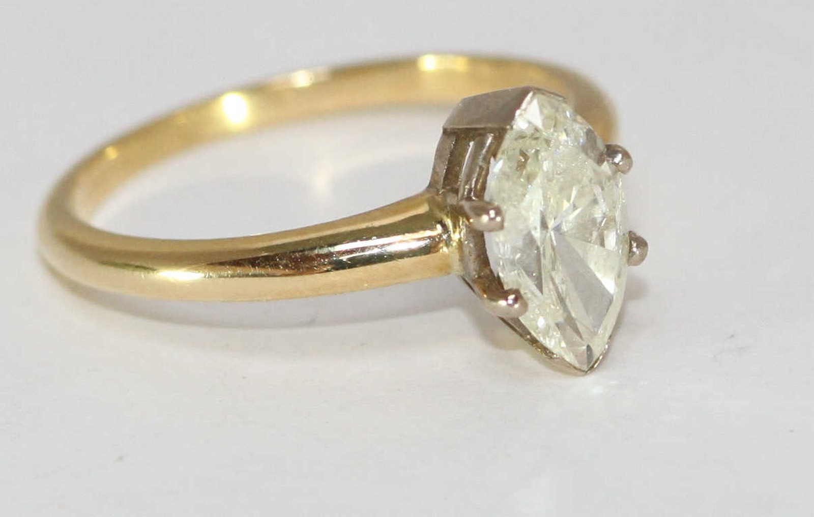 A ladies 18ct yellow gold and solitaire marquise-cut diamond ring, the claw-set marquise diamond - Image 2 of 2