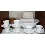 SECTION 13. A Western railways wash basin and a set of six white and gilt cups and saucers by