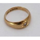 An early 20th century 18ct gold gypsy style ring, of tapering band design set with a small 'Old Cut'