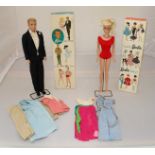 A Vintage Ken and Barbie doll, both boxed, Ken stock No.750, Barbie stock No.850, each with stand