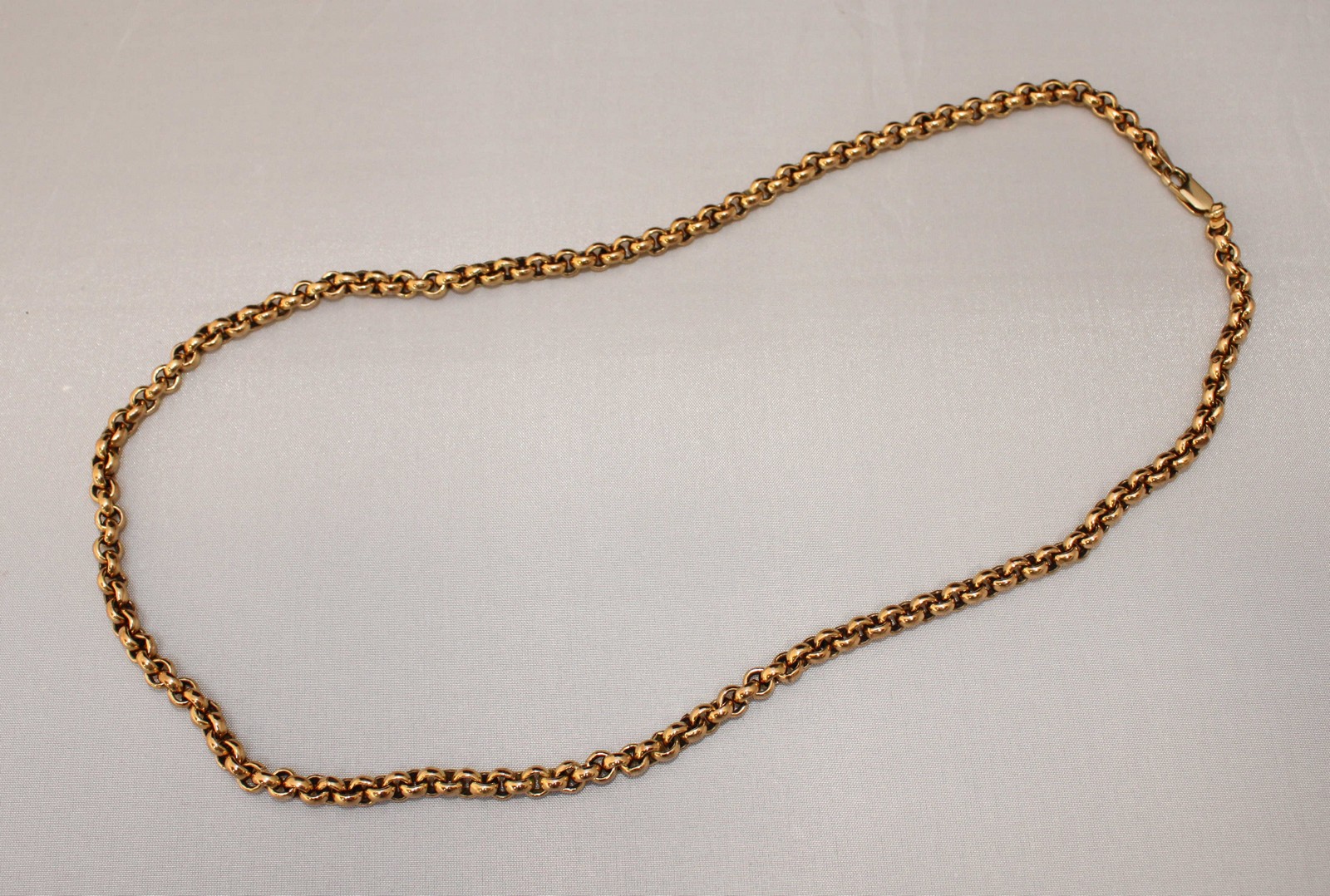 A heavy 9ct gold belcher link necklace, gross weight approximately 65g.