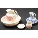 SECTION 12. A four piece 'Eldorado' pottery wash basin set, decorated with a pink floral design,