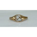 An 18ct gold 2-stone diamond ring, of cross-over design, estimated diamond weight 0.14pts, 2.85grms