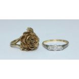 A 9ct gold ring modelled as a rose with leaves and stem forming the shank, 5.25grams, together