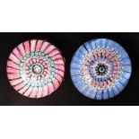 Two large Millefiori glass paperweights, one with a pink design, the other blue. 12.3cm in