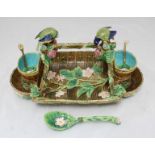 A George Jones Majolica Strawberry dish modelled as a rustic wooden trug with two Blue Tits