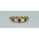 An 18ct gold three-ruby and two-diamond ring, 'Victorian cut' diamonds, estimated diamond weight 0.