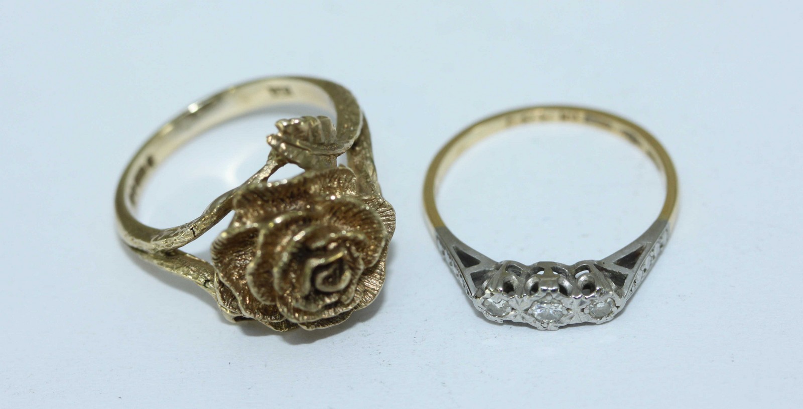 A 9ct gold ring modelled as a rose with leaves and stem forming the shank, 5.25grams, together - Image 2 of 2