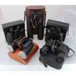 Five various cased pairs of binoculars, including examples by Lieberman & Gortz etc.