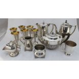 A quantity of assorted silver-plated items including a measure by Elkington and Co. six gilt