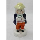 A Staffordshire pottery Toby figural sugar caster/pounce pot modelled as a portly gentleman