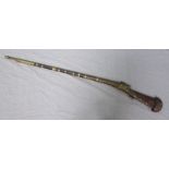 An antique Torador musket with decoratively chased metal mounts and bands (af)