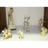 SECTION 21. A small collection of ceramic figures modelled as cherubs etc and two other figures