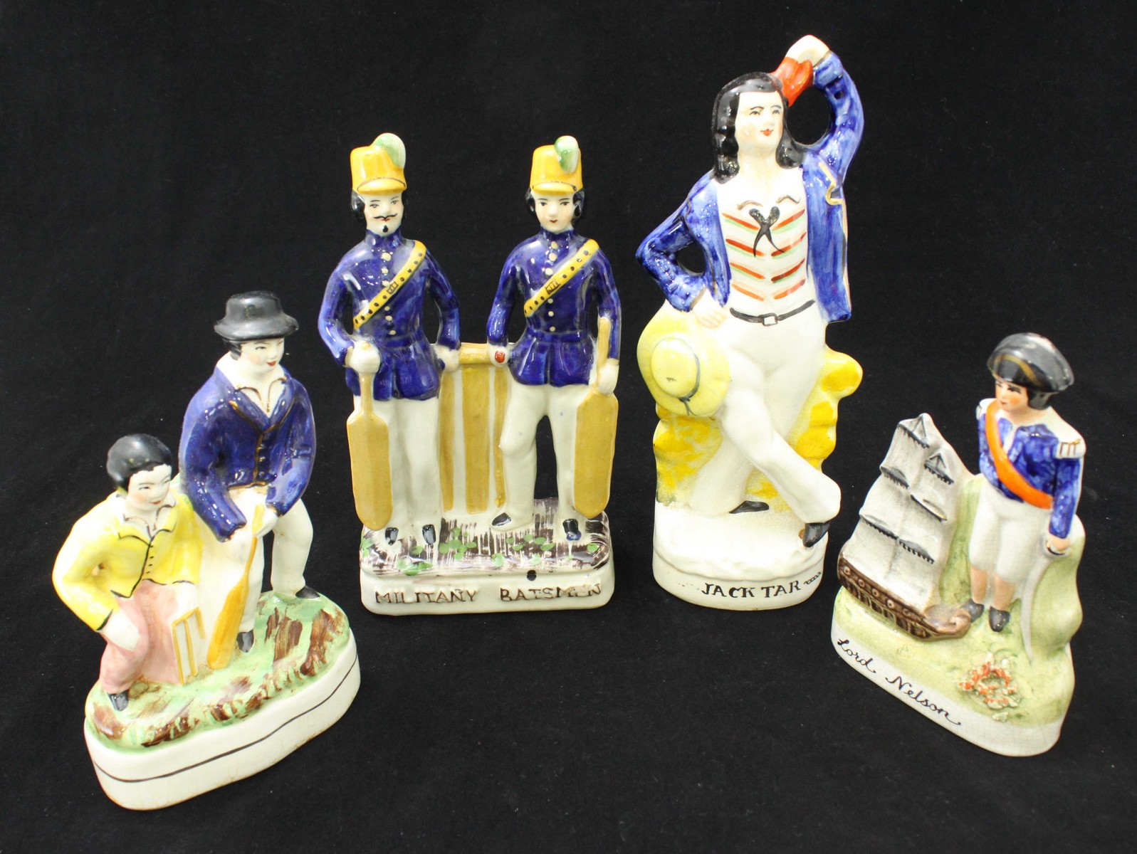 Four various Staffordshire pottery figures including 'Military Batsman' etc and an Oriental bowl - Bild 2 aus 2