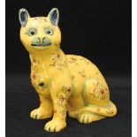 A 19th Century Gallé 'style' Faience pottery model of a seated cat, with yellow glaze, floral