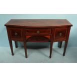 A nice quality Edwardian mahogany and satinwood cross-banded bow-front sideboard in the Sheraton