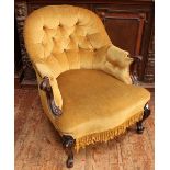 A Victorian stained wood tub chair, with yellow, button back fabric upholstery, scrolled arms and