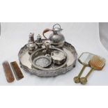 A silver-plated serving tray with raised pierced gallery, together with a Gurnsey cream jug,