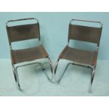 A pair of chrome cantilever chairs with original faded grey leather back and seat