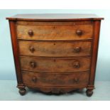 A 19th Century faded mahogany bow-front chest of four long graduated drawers, with shaped apron