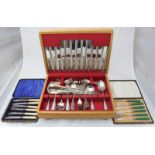 A canteen of silver plated flatware, together with two cased sets of six silver plated knives etc.