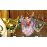 Six various free-form coloured glass vases.