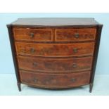 A 19th Century mahogany and cross-banded bow-front chest of two short over three long graduated