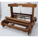 A 'Weavemaster' beechwood table loom, 40cm wide x 35cm high