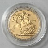 A 1985 22ct gold proof full sovereign, in fitted box, gross weight approximately 7.98g.