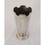 A silver vase by Garrard & Co. of cylindrical tapered form, with vertical fluted decoration to a