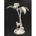 A 19th century electroplated centrepiece by Elkington and Co. modelled with two greyhounds amidst